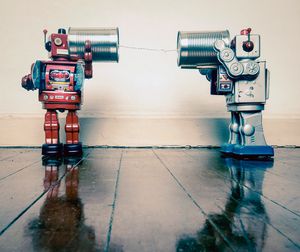 tin can phone robots - Charles Taylor
