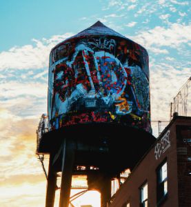 Another NYC water tower at sunset