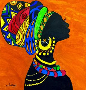 African woman painting canvas