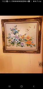 Beautiful gold framed signed flowers