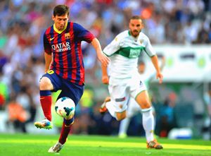 Lionel Messi controls the ball durin