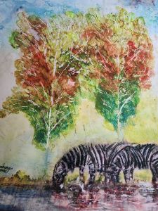 Zebras beneath trees