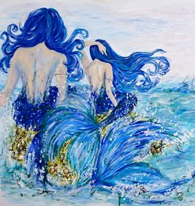 Mermaids Sitting On Rock