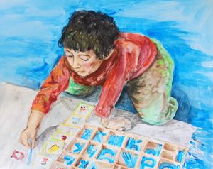 Young child working with Alphabet