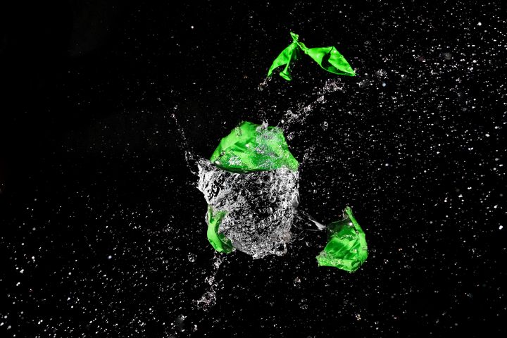 Green Balloon pops into pieces - Sotiriadis Giannis