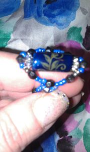 blue and black beaded ring