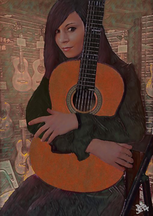 A girl holding a guitar - Danilo Del Tufo