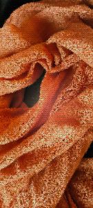 Soft orange sparkly fabric