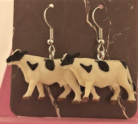 Cow on sale with earrings