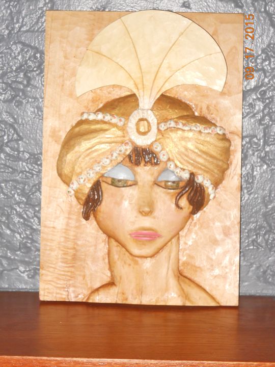 carved art deco woman - RSPeck