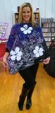 Purple and white with flowers poncho