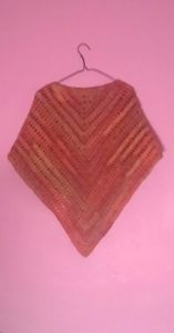 Hand crocheted triangluar shawl