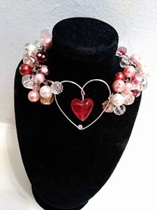 Crystal heart charm bracelet - A Skilled Hand