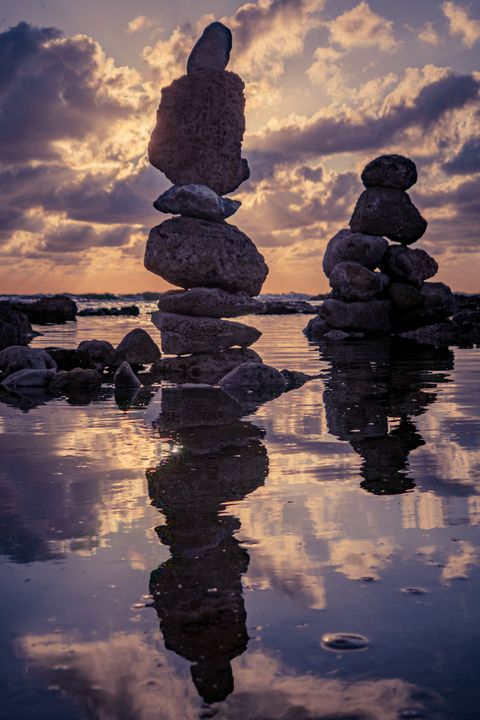 Stone sculptures with reflection - MigoPhotos