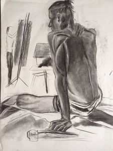 Seated nude man facing painter