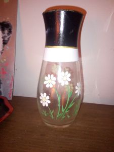 hand painted vase with flowers