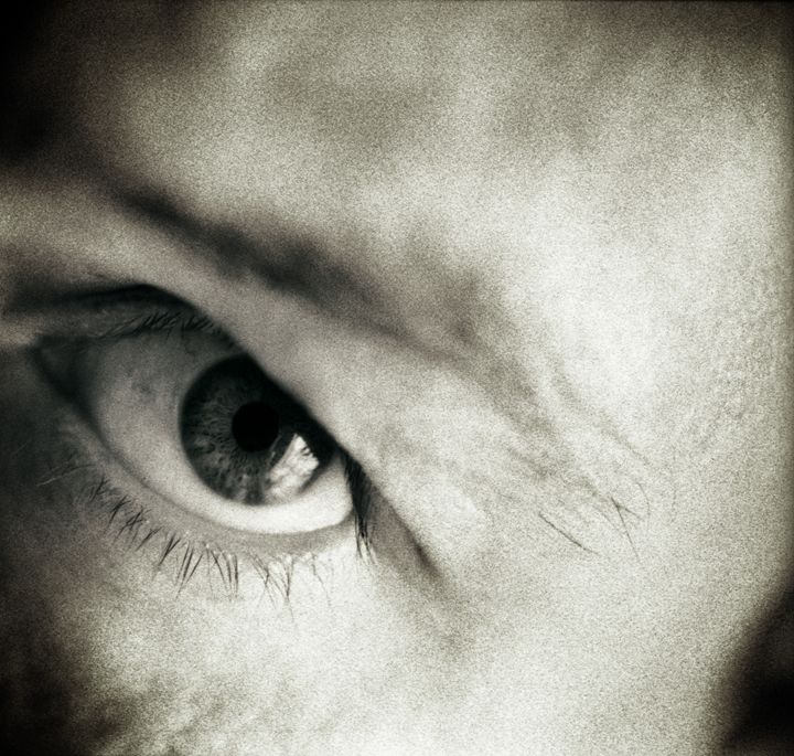 Closeup of eye of man black white - edwardolive