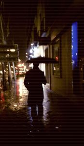 Man walking in street at night c41
