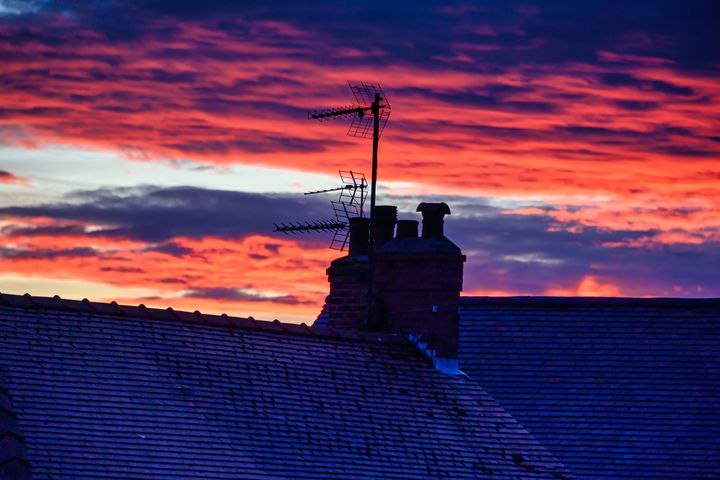 Roof Top Sunset - Photographs by David Hollingworth