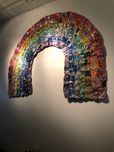 A Rainbow shines under the dirt - The Scraper
