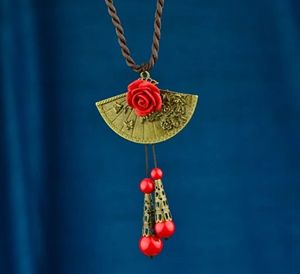 Sweater Necklace with Red Flower