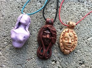 Hand sculpted pendants.