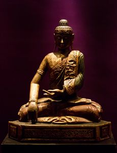 The sitting Buddha.