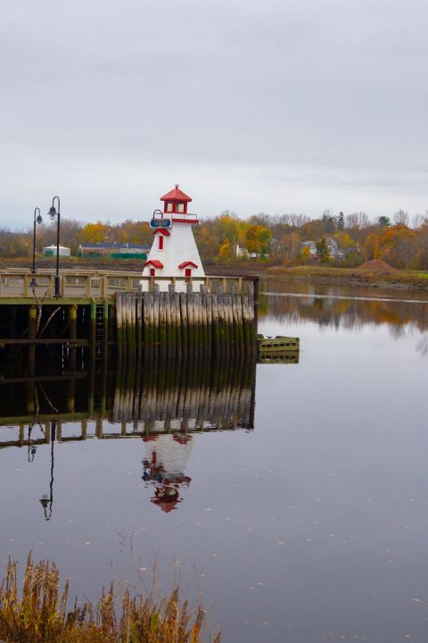 Reflection of a Lighthouse - Dark Dreamer Photography