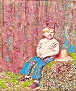 cute boy on hay