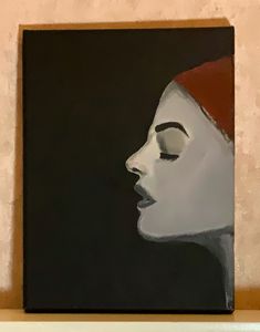 Profile of a girl in red bandana