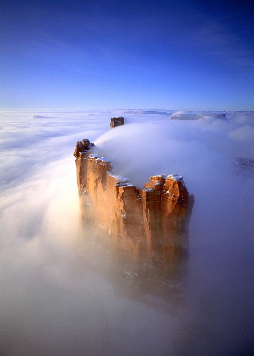 MONUMENT VALLEY IN WINTER CLOUDS - BILL LEVERTON