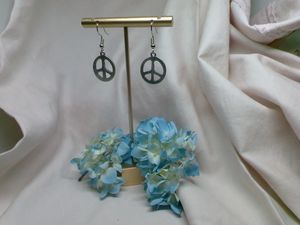 Peace sign earrings charity below