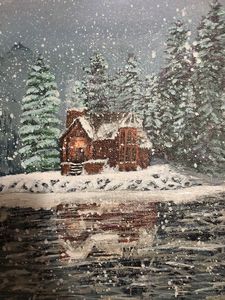 Snow cottage by the lake