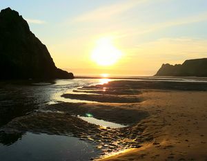 Three cliffs sunset