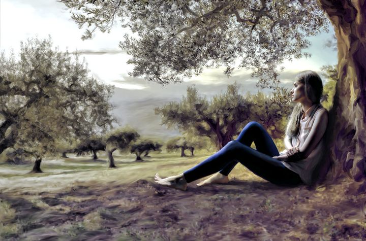 Beautiful woman sitting under a tree - Printsonplaces