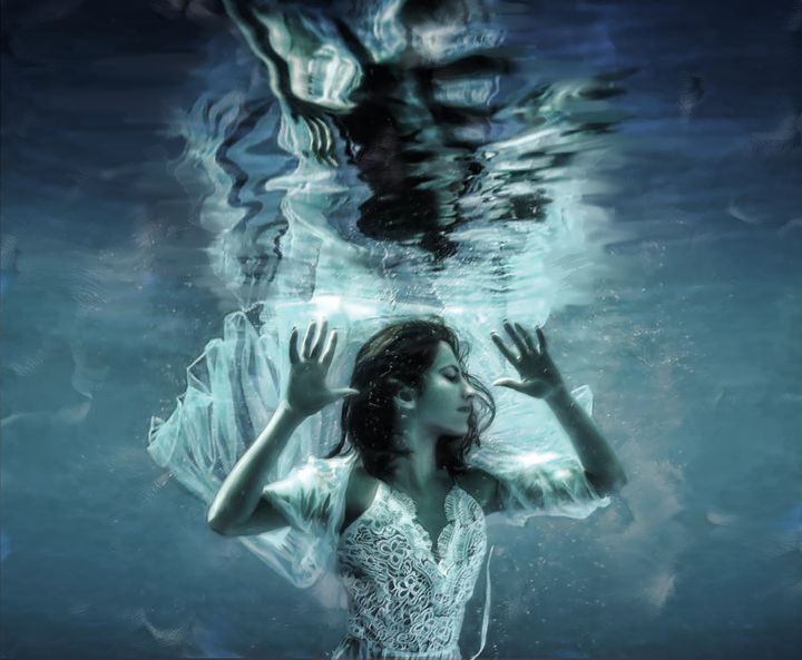 Woman floating underwater - Printsonplaces
