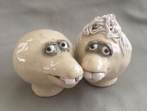 Pottery salt store and pepper shakers