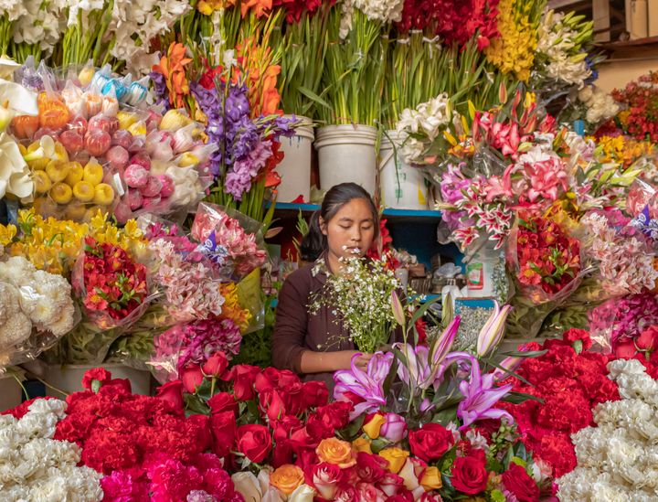 Flower vendor in San Pedro, Peru Jesse Roberts Photography