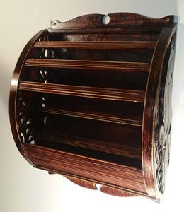Hand carved wall mounted holder