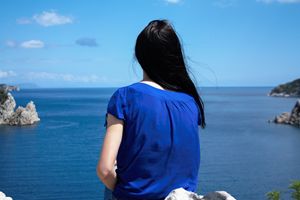 Girl looks at the sea
