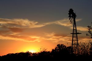 Kansas Golden Sunset with a Windmill