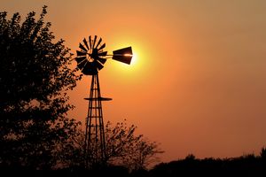 Kansas Golden sky with a Windmill